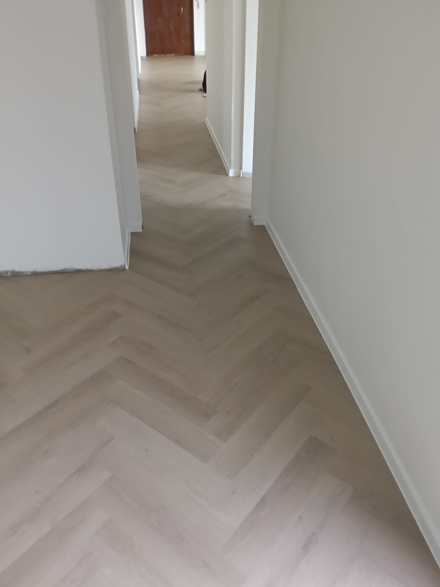 Herringbone vinyl flooring corridor
