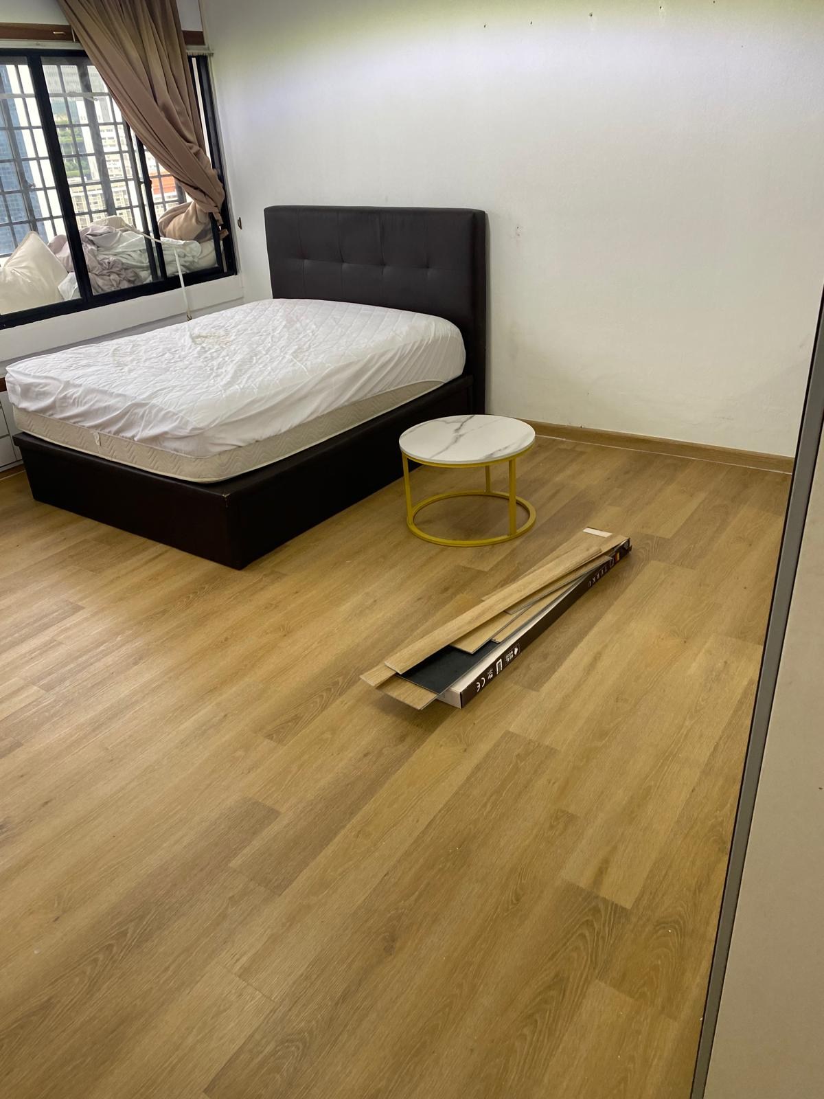 Bedroom with bed and vinyl flooring